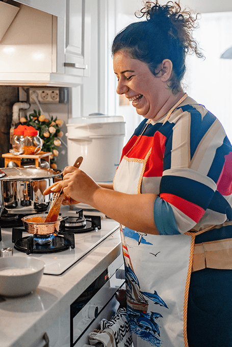 Woman cooking in kitchen